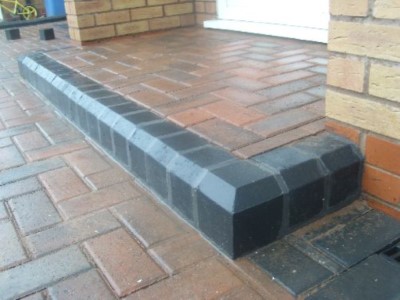 Square door step with kerbs